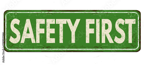 Safety first vintage rusty metal sign
