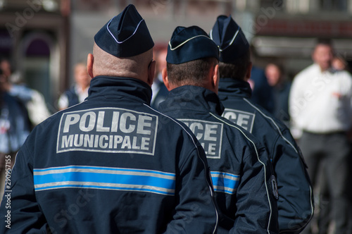  Portrait of policemen standing on the main place during  the Thirtieth anniversary ceremony of the creation of the municipal police photo