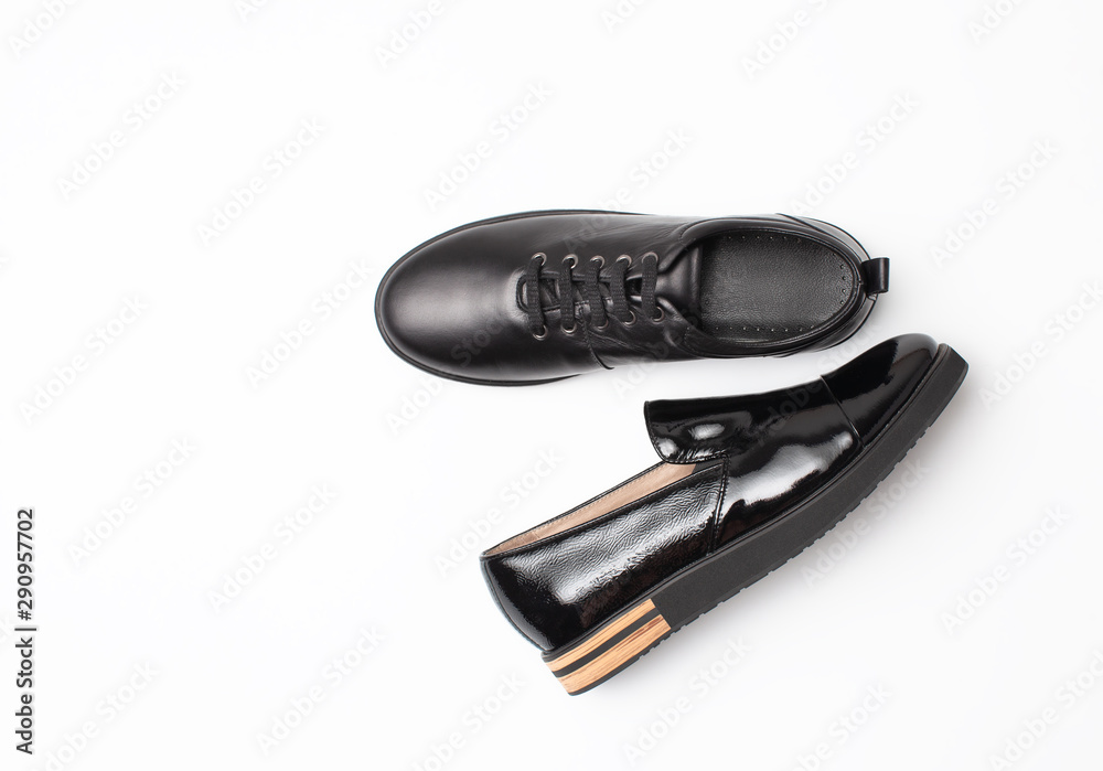 Women's leather autumn ankle boots and patent moccasin on a white background Women's leather autumn ankle boots and patent moccasin on a white background