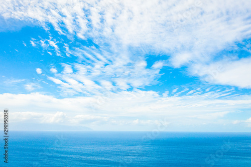 Aerial View of the Blue and Turquoise Sea and Cloudy Sky - Image