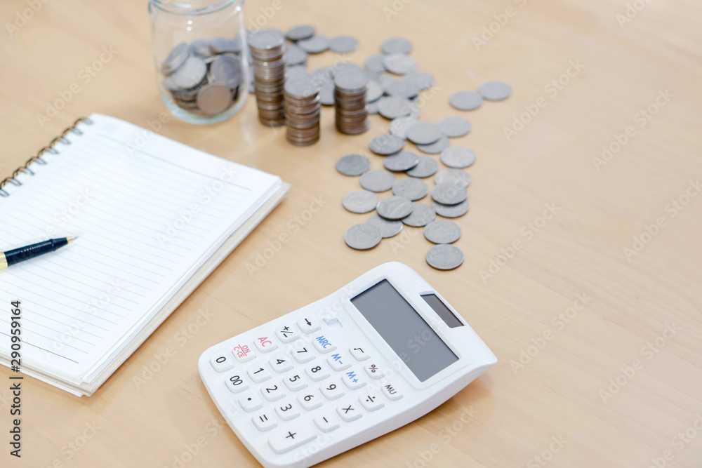 Office: Note Book, Calculator, Coins and Pen