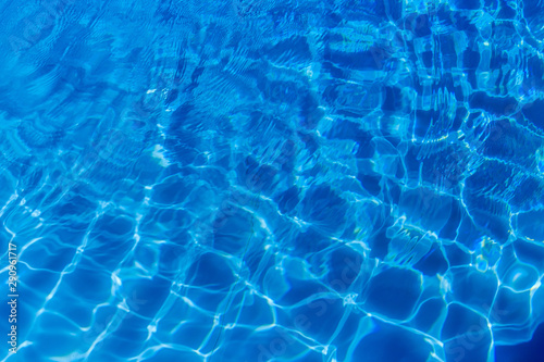 Clear blue water in swimming pool © ohm2499