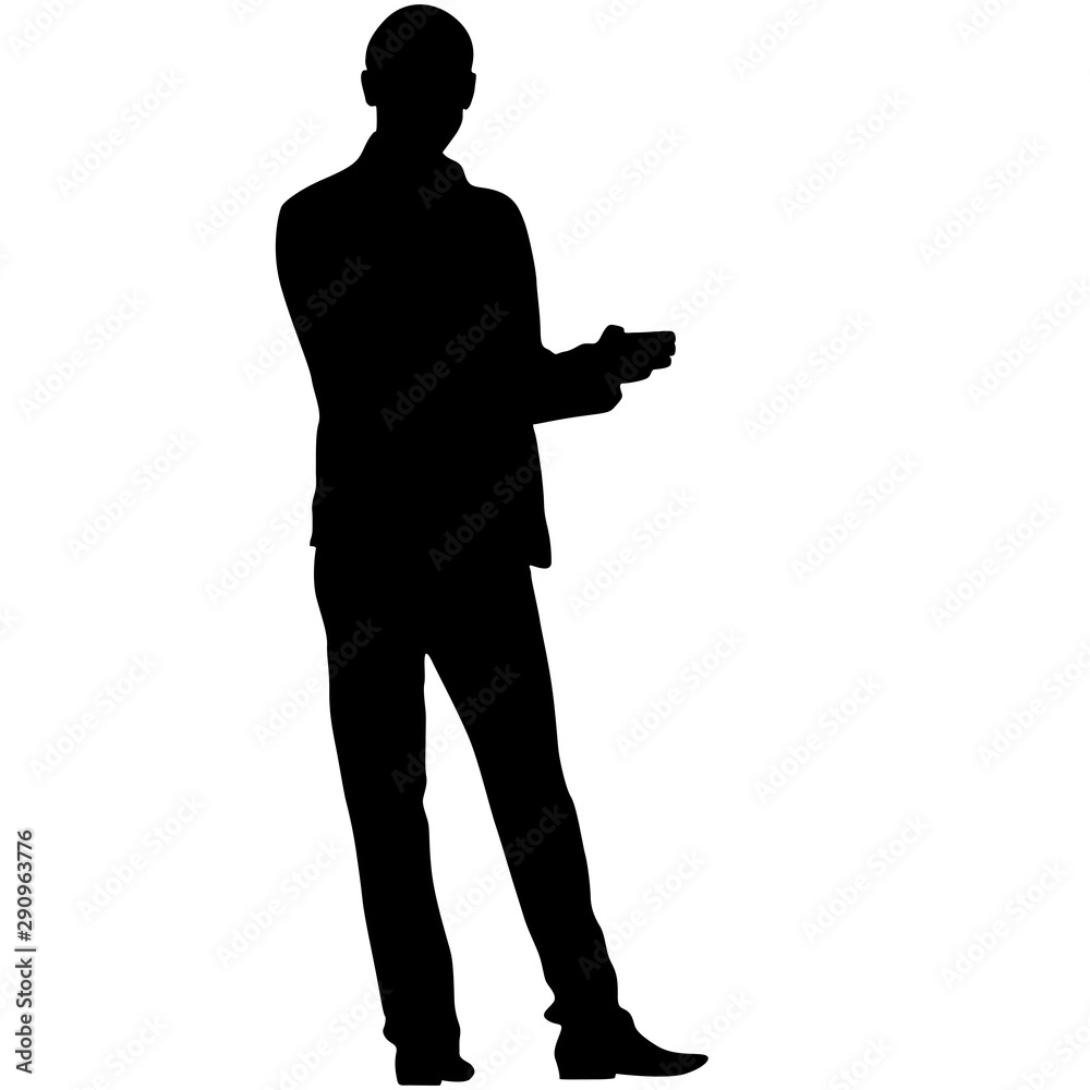 A man stands with his hands in front, silhouette on a white background A man stands with his hands in front, silhouette on a white background