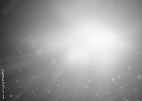 Gray sparkle rays with bokeh abstract elegant background. Dust sparks background.