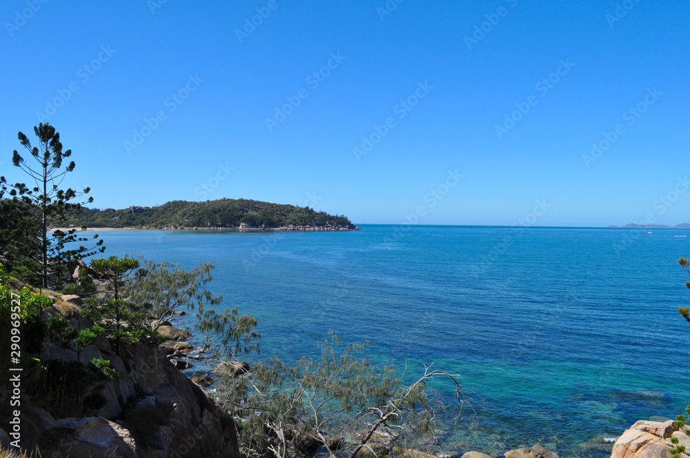 Coastal view and headland at Geoffrey Bay seen from The Gabul Way, a raised floating walkway linking Nelly Bay and Geoffrey Bay on Magnetic Island, Queensland, Australia