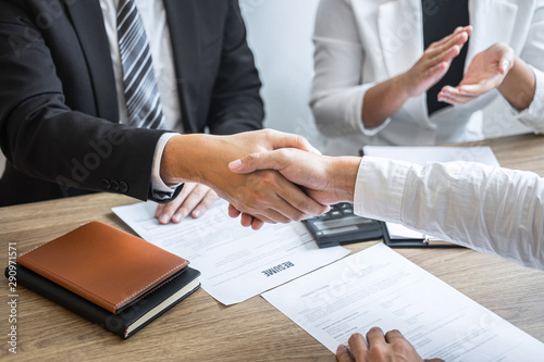 Foto Successful job interview, Image of Boss employer committee or recruiter in suit