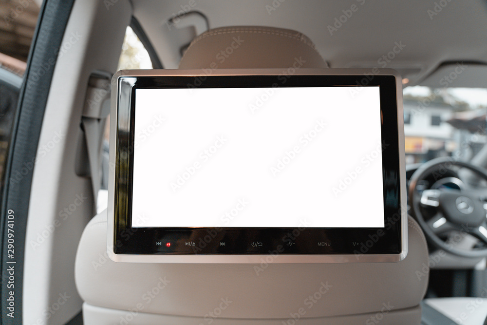 Small monitor TV led white screen display inside luxury car for entertain. Small monitor TV led white screen display inside luxury car for entertain.