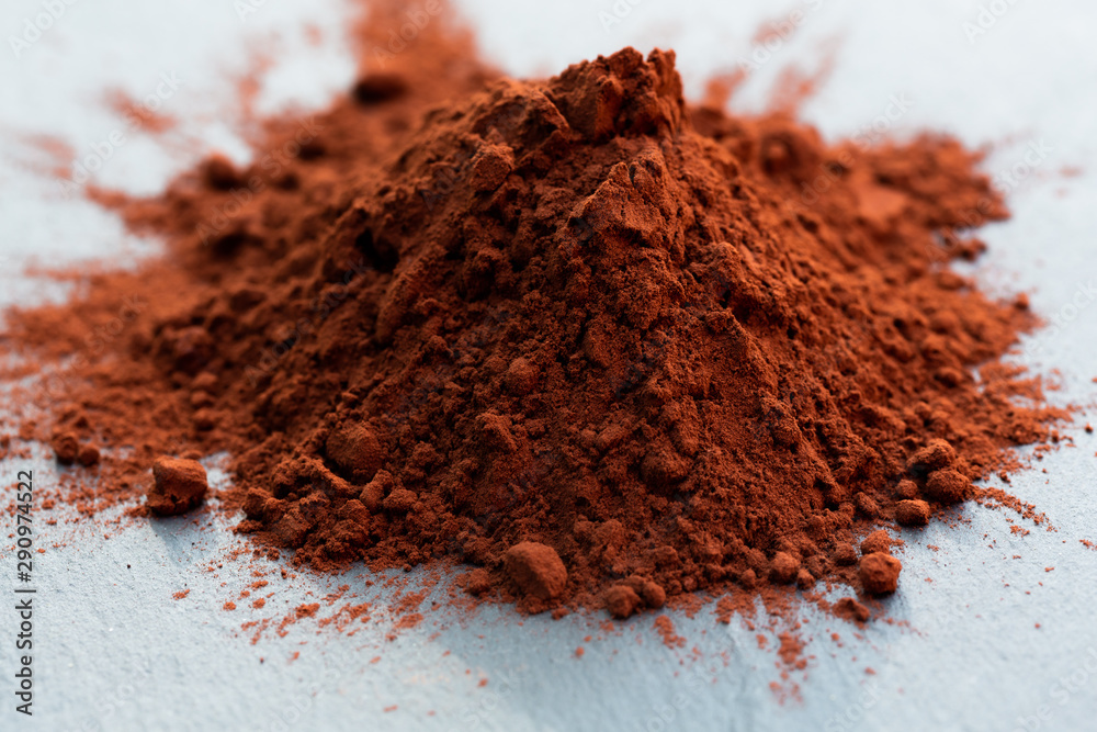 pile of cocoa powder pile of cocoa powder