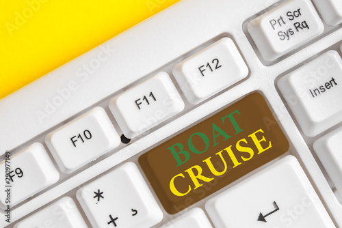 Handwriting text Boat Cruise. Conceptual photo sail about in area without precise destination with large ship White pc keyboard with empty note paper above white background key copy space