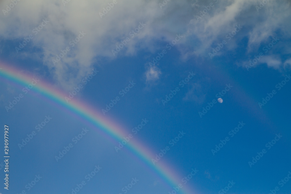 Rainbow and moon over Angkor Wat, Cambodia