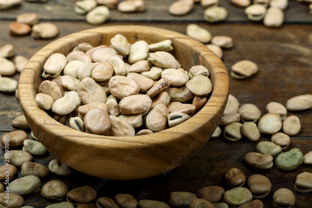 beans in a wooden plate beans in a wooden plate