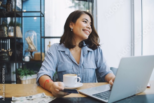 businesswoman working on laptop in office