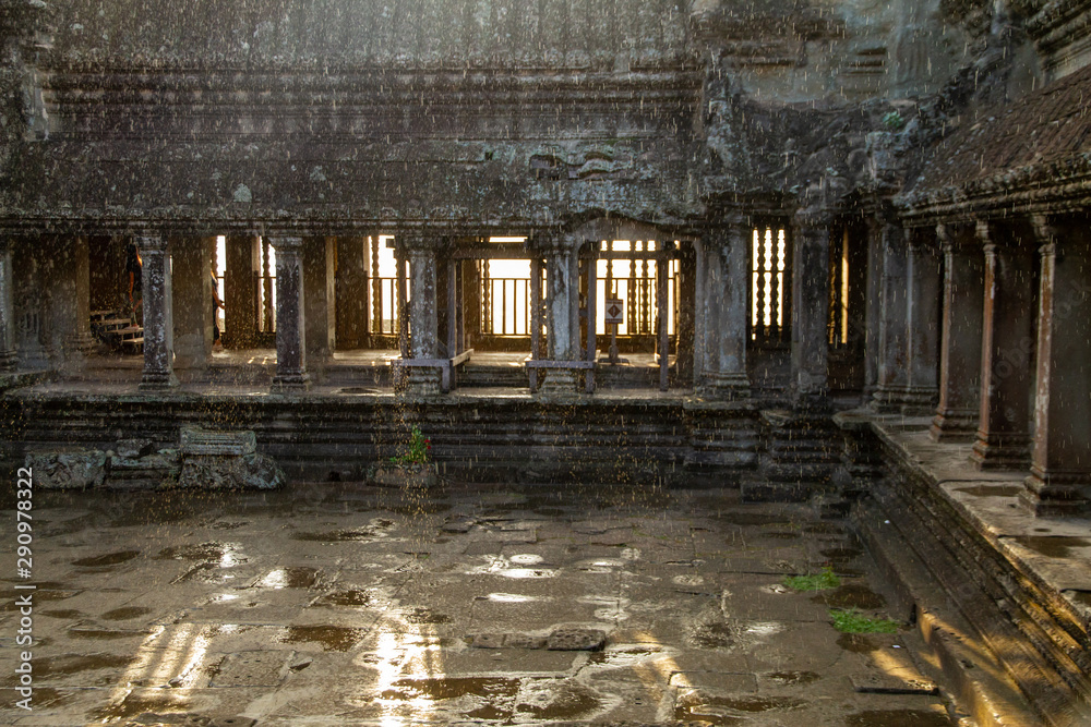 Angkor Wat temple courtyard in rain