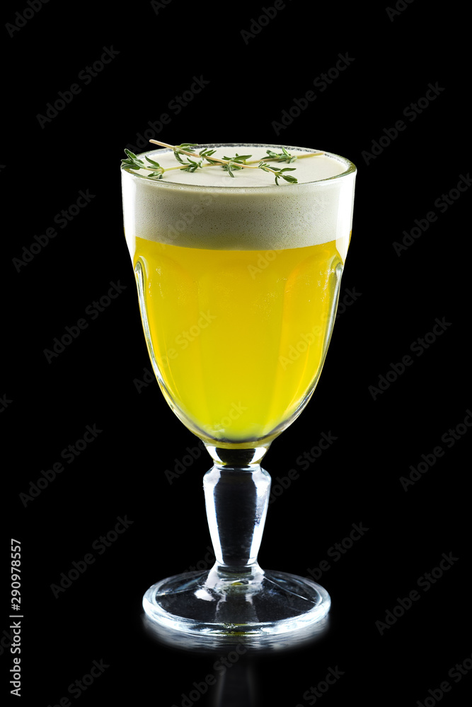 Glass of hot ginger grog isolated on black Glass of hot ginger grog isolated on black