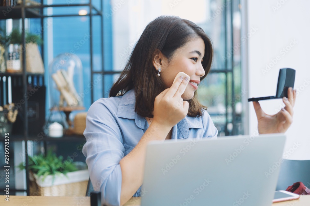 business woman working on laptop in office business woman working on laptop in office