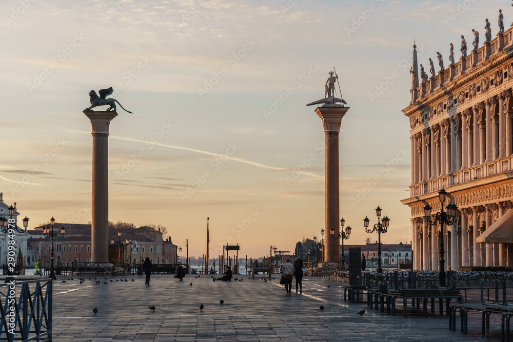 Sunrise view of piazza San Marco, Doge's Palace (Palazzo Ducale) in Venice, Italy. Sunrise cityscape of Venice.