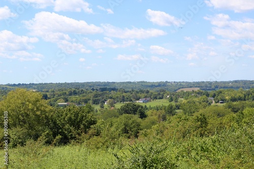 A beautiful view of the countryside valley on a sunny day.