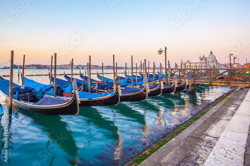 Gondolas by Saint Mark square at sunrise, Venice, Italy © k_samurkas