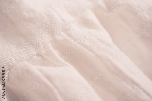 White linen textile closeup. Selecive focus.