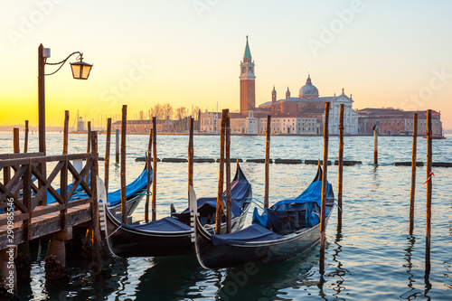 Sunrise at Venice with gondola and island of st george view from the square San marco © k_samurkas