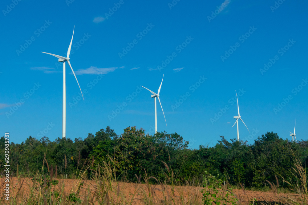 Many wind energy turbine with sunlight. Many wind energy turbine with sunlight.