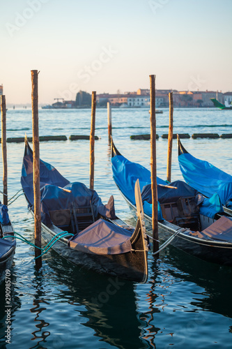 Gondolas by Saint Mark square at sunrise, Venice, Italy © k_samurkas