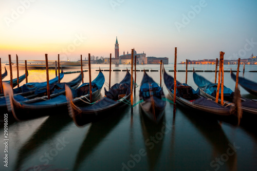 Sunrise at Venice with gondola and island of st george view from the square San marco photo