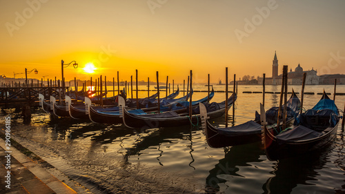 Sunrise at Venice with gondola and island of st george view from the square San marco © k_samurkas