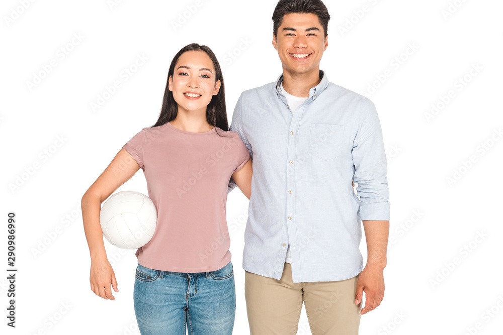 pretty asian girl holding volleyball while hugging handsome boyfriend isolated on white pretty asian girl holding volleyball while hugging handsome boyfriend isolated on white