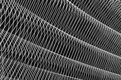 abstract long exposure blurred light lines black and white background. Geometric shapes