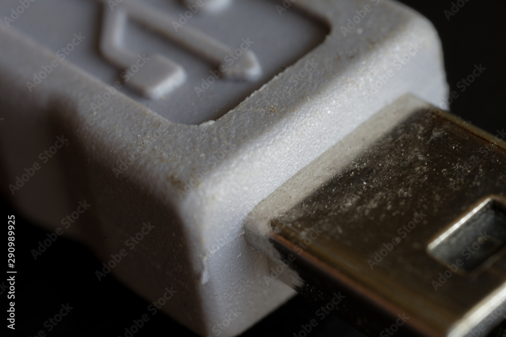 Close up of an Micro B sized of Universal Serial Bus (USB) cable. Close up of an Micro B sized of Universal Serial Bus (USB) cable.