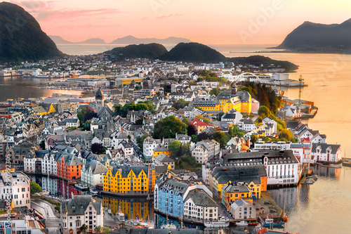 Alesund is a port and tourist city at the entrance to the Geirangerfjord.