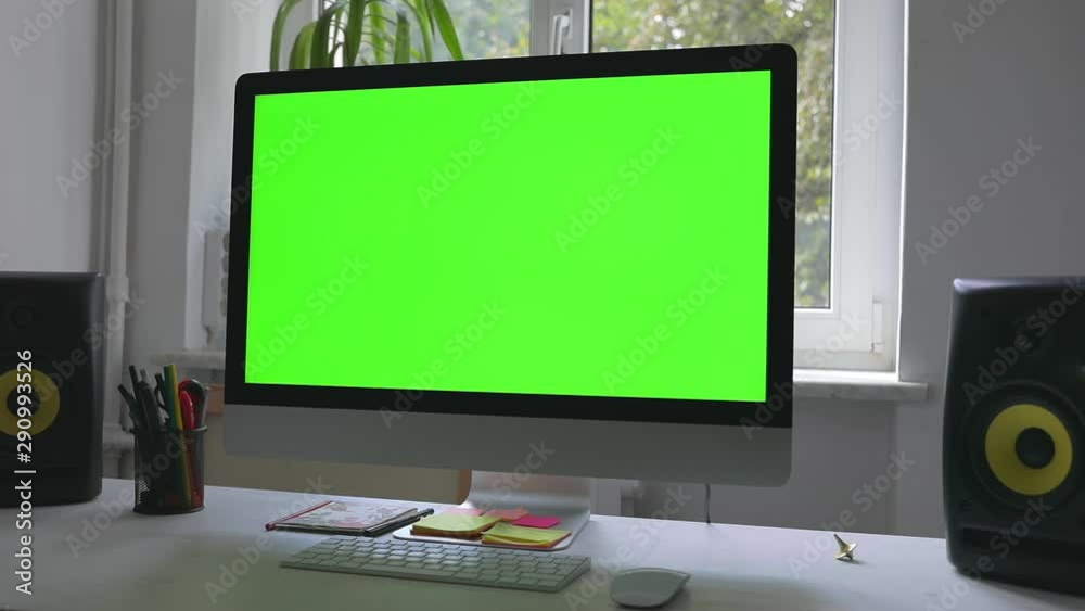 Workplace at loft room with personal computer green screen and chroma key work at home Workplace at loft room with personal computer green screen and chroma key work at home