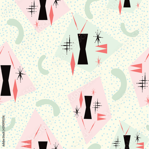 Mid century modern seamless pattern inspired from 1950's atomic poster art. Pale yellow background with pink, green, coral and black. For textiles, graphic design, fashion, paper items, gift wrapping.