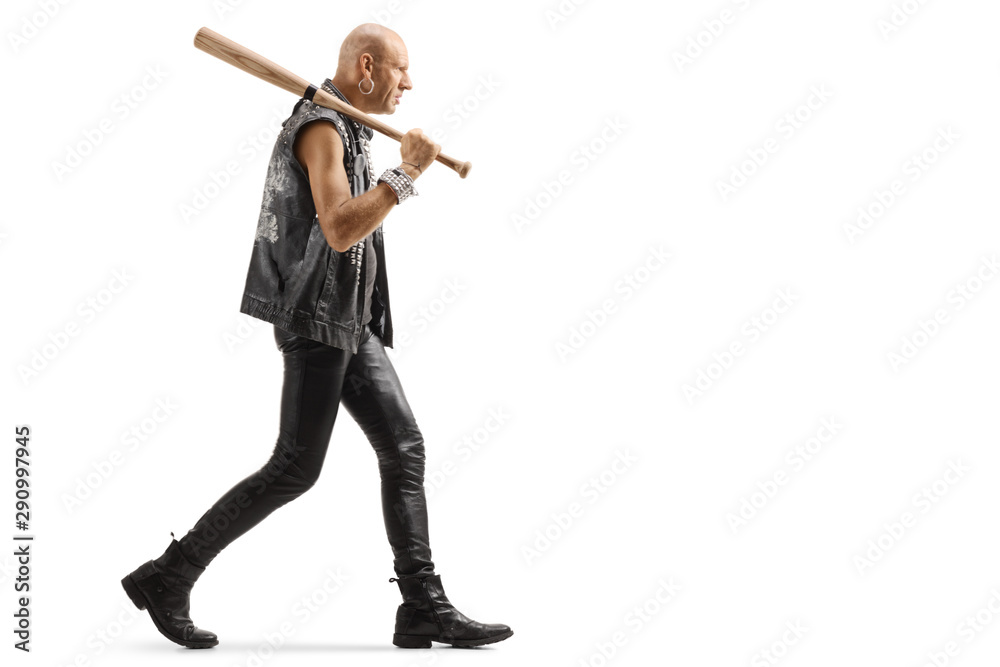 Dangerous man in leather clothes walking with a baseball bat Dangerous man in leather clothes walking with a baseball bat
