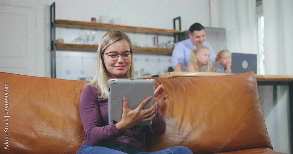 Mother relaxing on couch