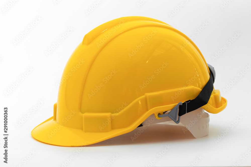 Fototapeta premium Yellow safety helmet side view isolated on white background