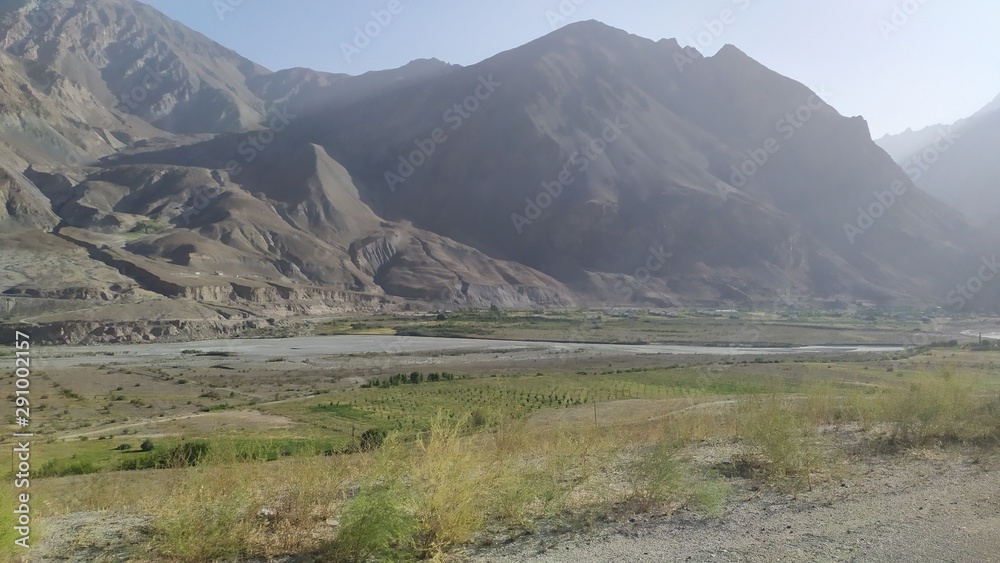 View on Wakhan Corridor in Afghanistan behind the Wakhan river. Taken from Pamir highway on Tajikistan side.