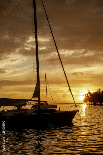 Silhouette boat with a beautiful sunset