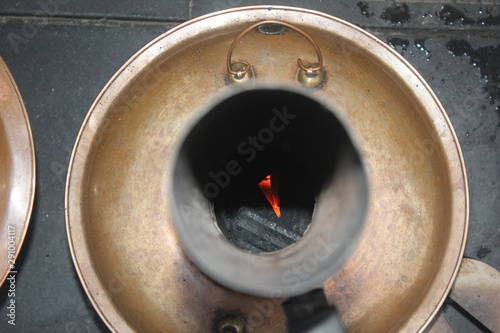 red fire inside a Chinese pot