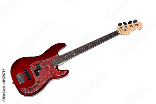 Bass guitar in cherry-colored wood on a white background