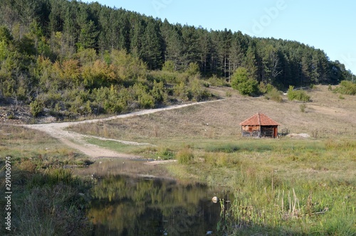 a small wooden mountain house