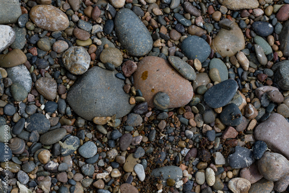 Rocky beach Sea on a cloudy day closeup Rocky beach Sea on a cloudy day closeup
