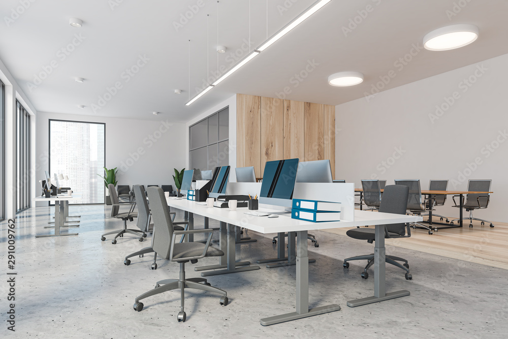 White open space office with meeting room
