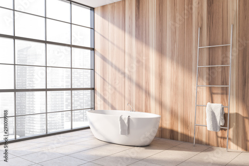 Wooden bathroom corner with tub and ladder