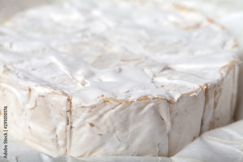 Camembert cheese is cut into pieces and whole. Camembert cheese is cut into pieces and whole.
