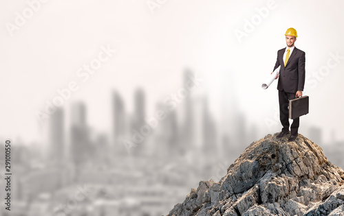 Young business person looking to the city from distance
