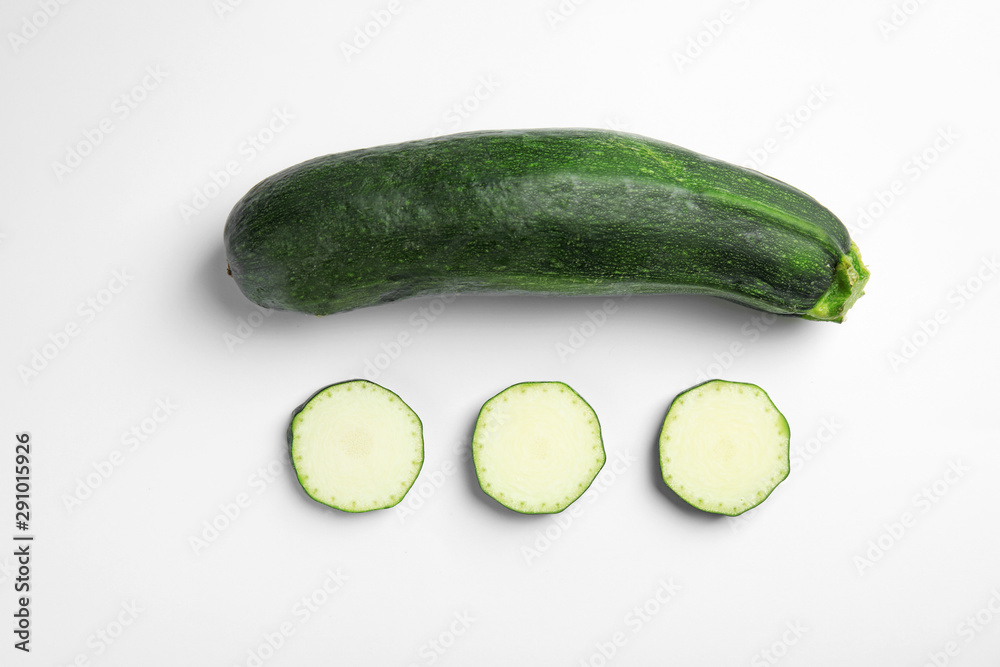 Fresh ripe green zucchinis on white background, top view Fresh ripe green zucchinis on white background, top view
