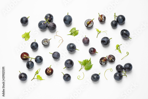 Fresh ripe juicy grapes on white background, top view photo