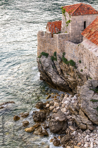 Budva  Montenegro. View of the Budva citadel and the sea waves